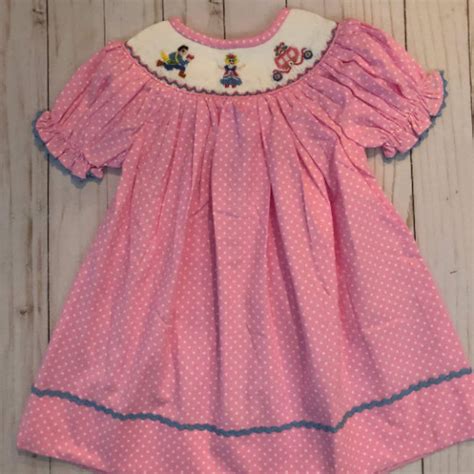 Whimsical and Chic: Disney Smocked Clothing for Kids